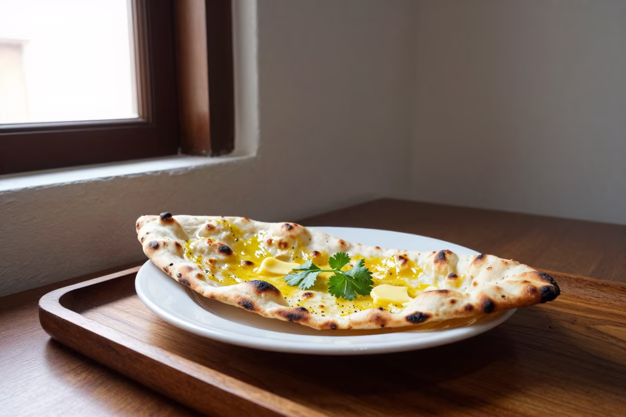 Garlic Butter Naan on Tea House Tray in on a tea house tray in Quevedo