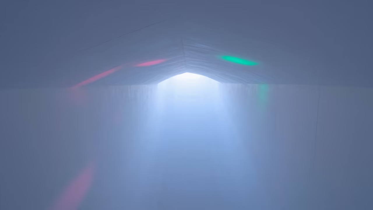 Geometric Ceiling Tiles in Neon Light in inside a vaulted atrium in Brantford