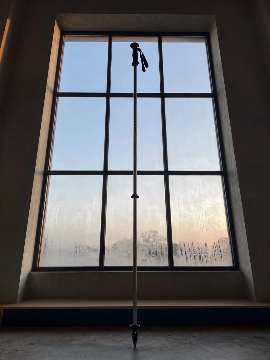 Giant Trekking Pole Monolith at Villa Nueva Dawn in on a painted display ledge in Villa Nueva