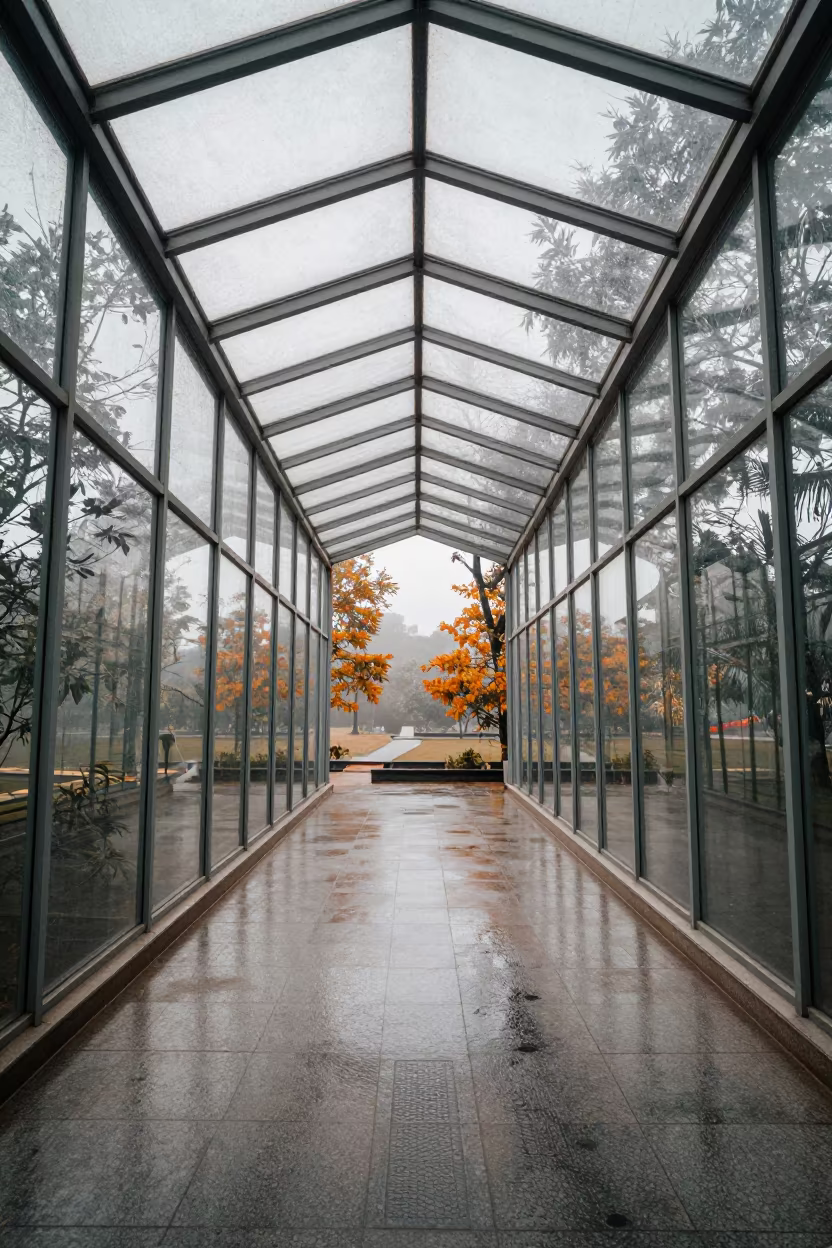 Glass Pavilion Reflecting Autumn Trees in Bangalore Atrium in inside a vaulted atrium in Bangalore