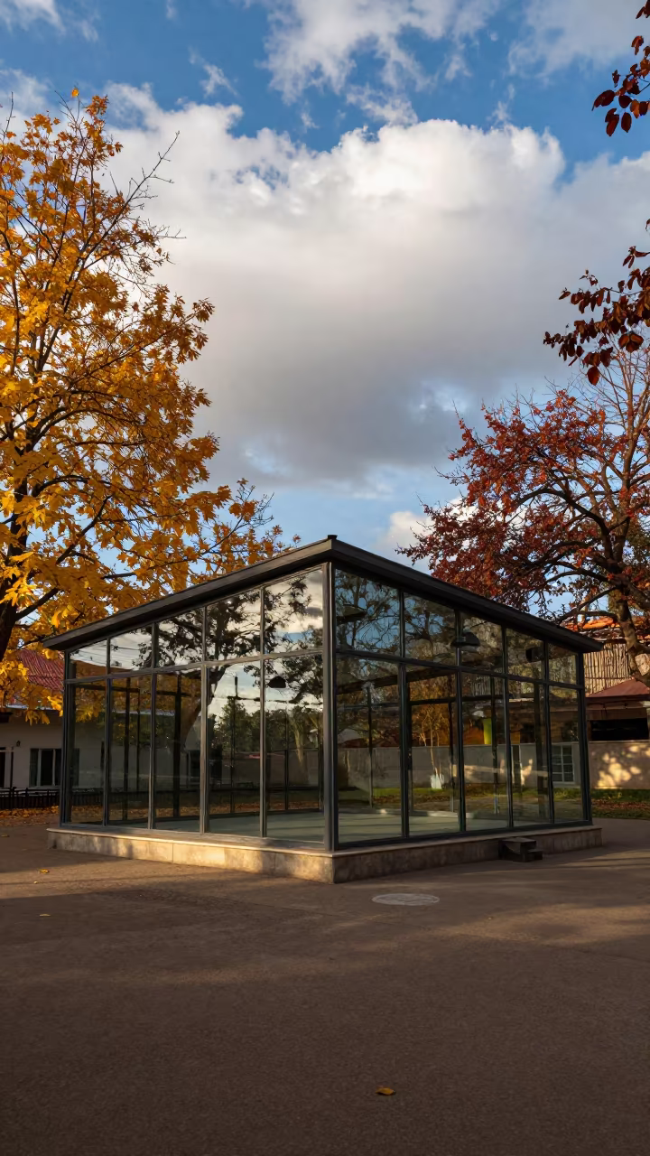 Glass Pavilion Reflecting Autumn Trees Wolaita Sodo in inside a skylit passageway in Wolaita Sodo