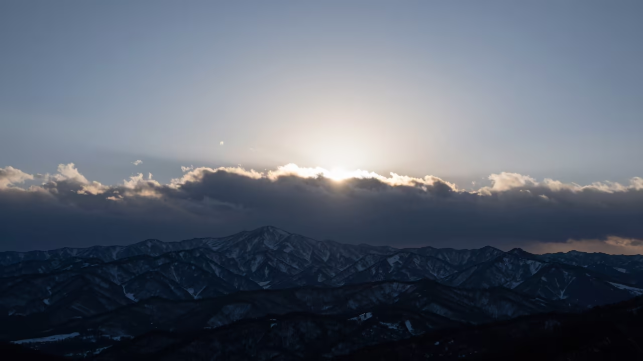 Glory Halo Shadow on Winter Clouds in over a horizon of stacked thunderheads in Chubu