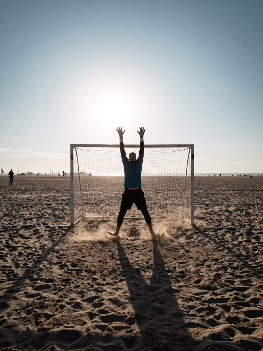 Goalkeeper Blocks Shot on Alexandria Beach in along a beach near Alexandria