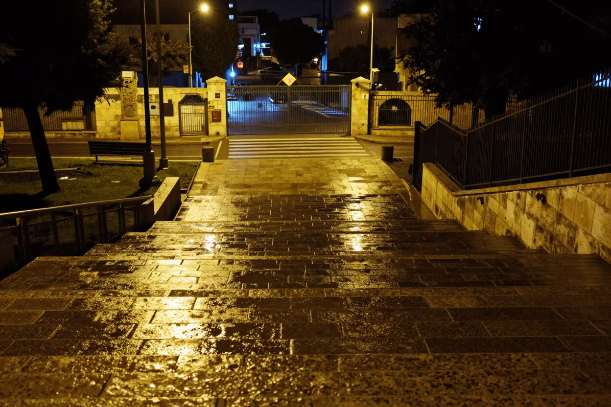 Gold Light on City Hall Stairs After Crowd Leaves in at a crosswalk by a school gate in Beersheba