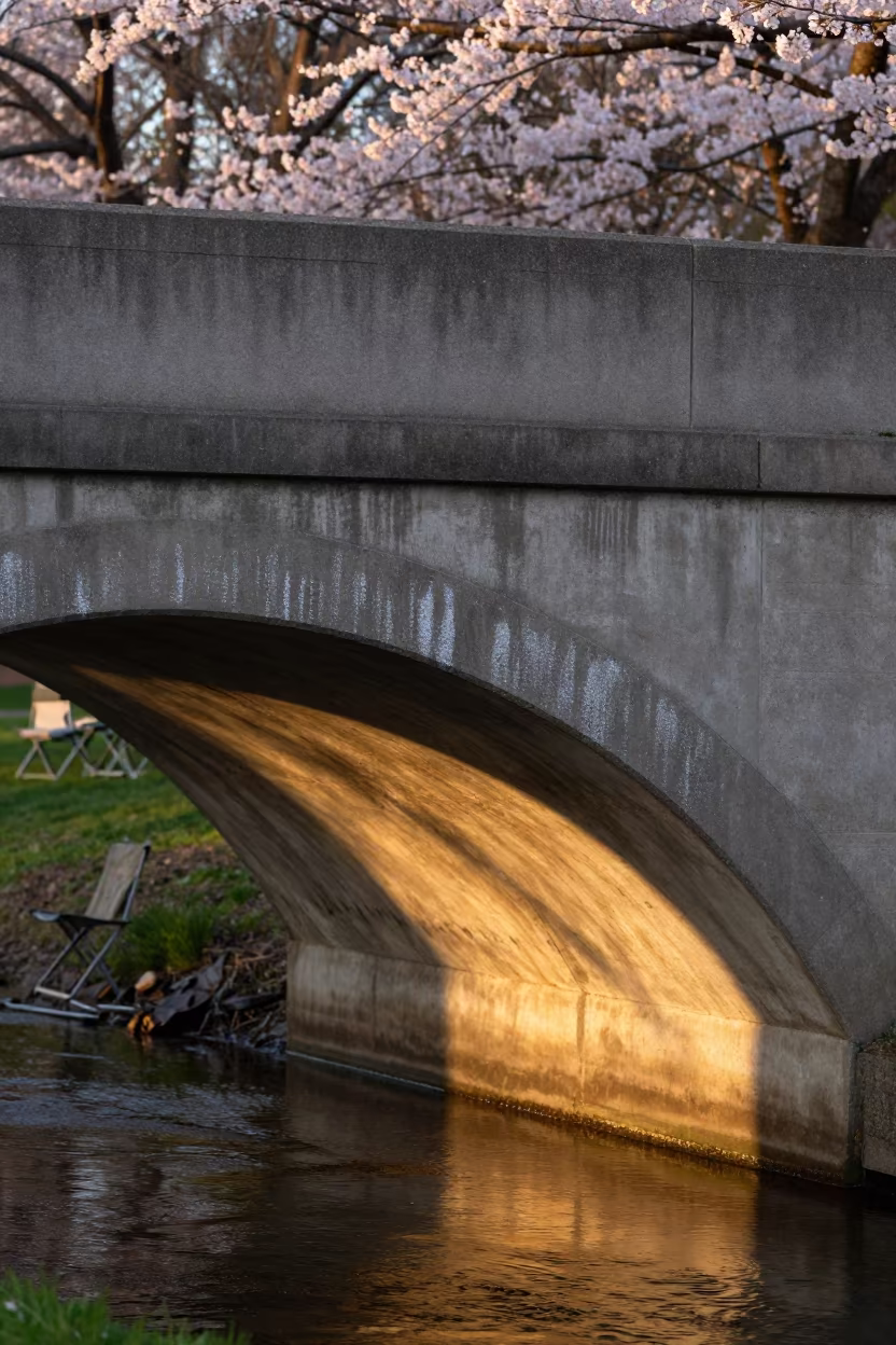 Golden Hour Bridge Detail Chalk Dust in on a graduation lawn under folding chairs in Wuhan