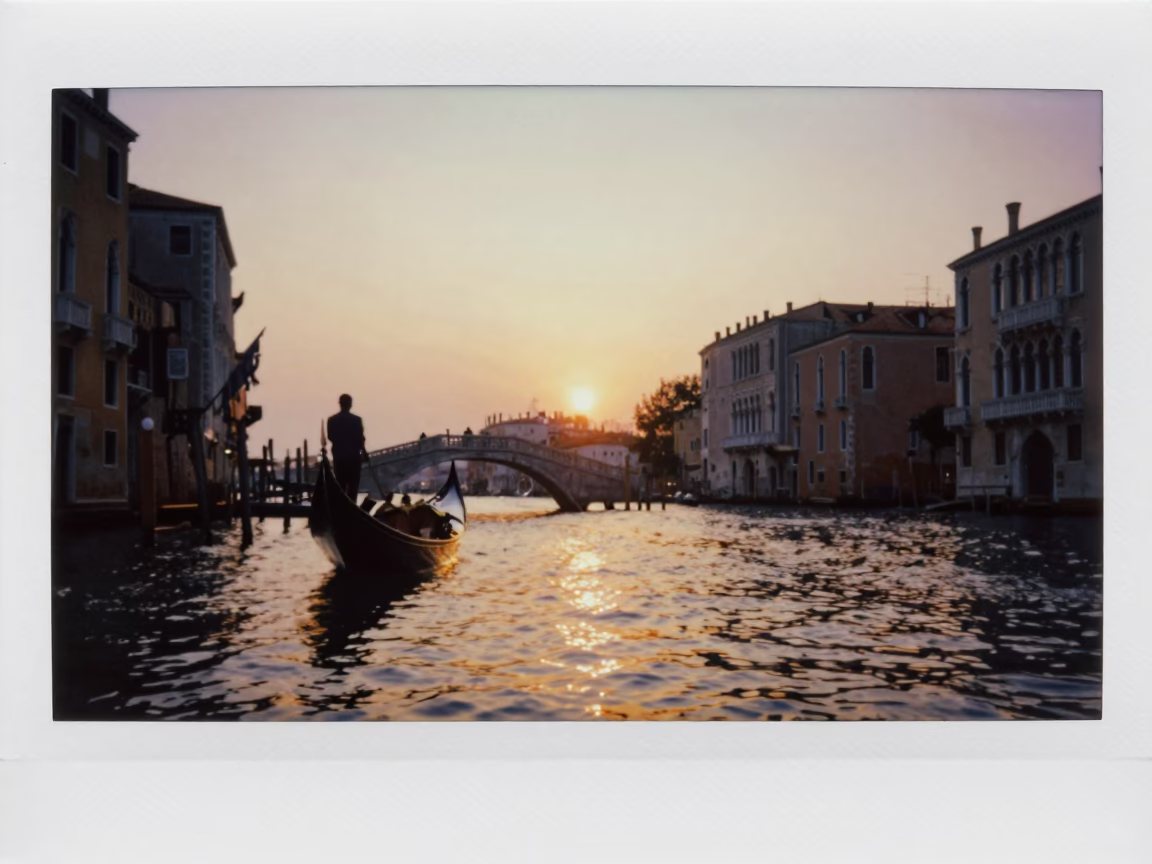 Golden Hour Canal Reflections with Passing Gondola in Venice in in Venice, Italy