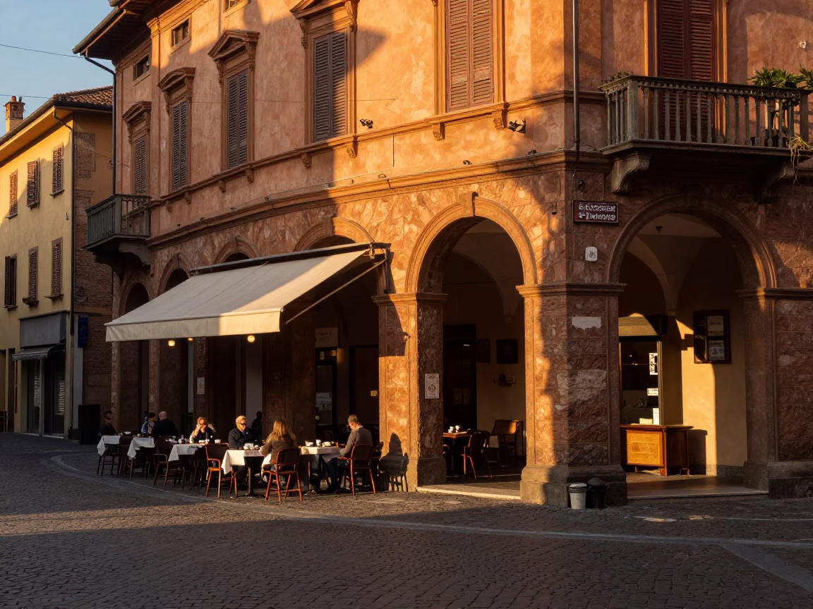 Golden Hour Light on Historic Bologna Street with Traditional Espresso and Daily Life in in Bologna, Italy