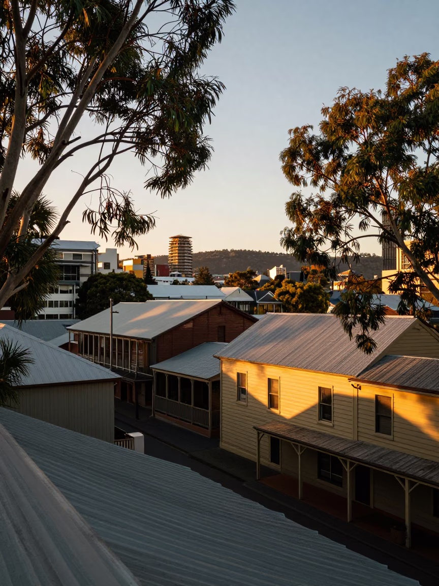Golden Hour Light on Hobart Rooftops with Eucalyptus Trees and Vintage Car in Tasmania in in Hobart, Tasmania, Australia