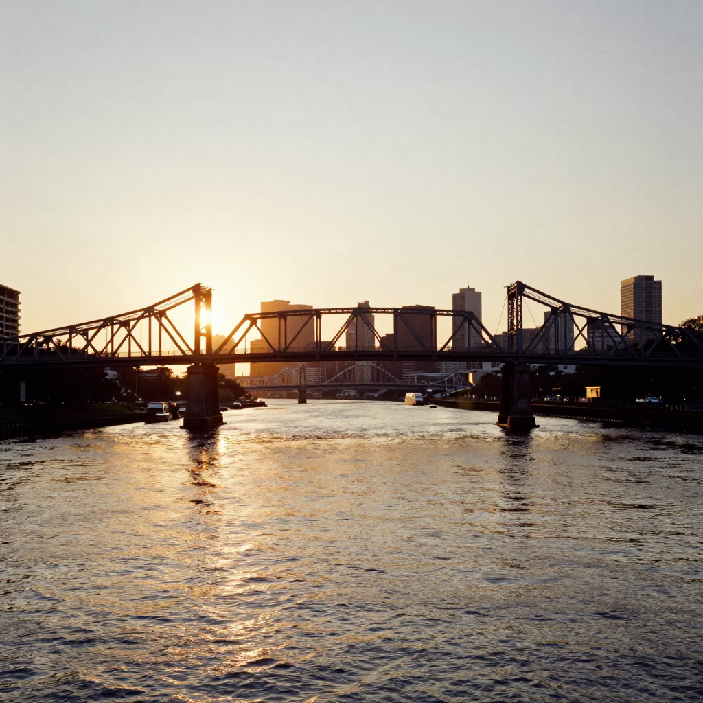 Golden Hour Light on New Orleans Drawbridge and Tidal Channel Waterway in in New Orleans, Louisiana, United States