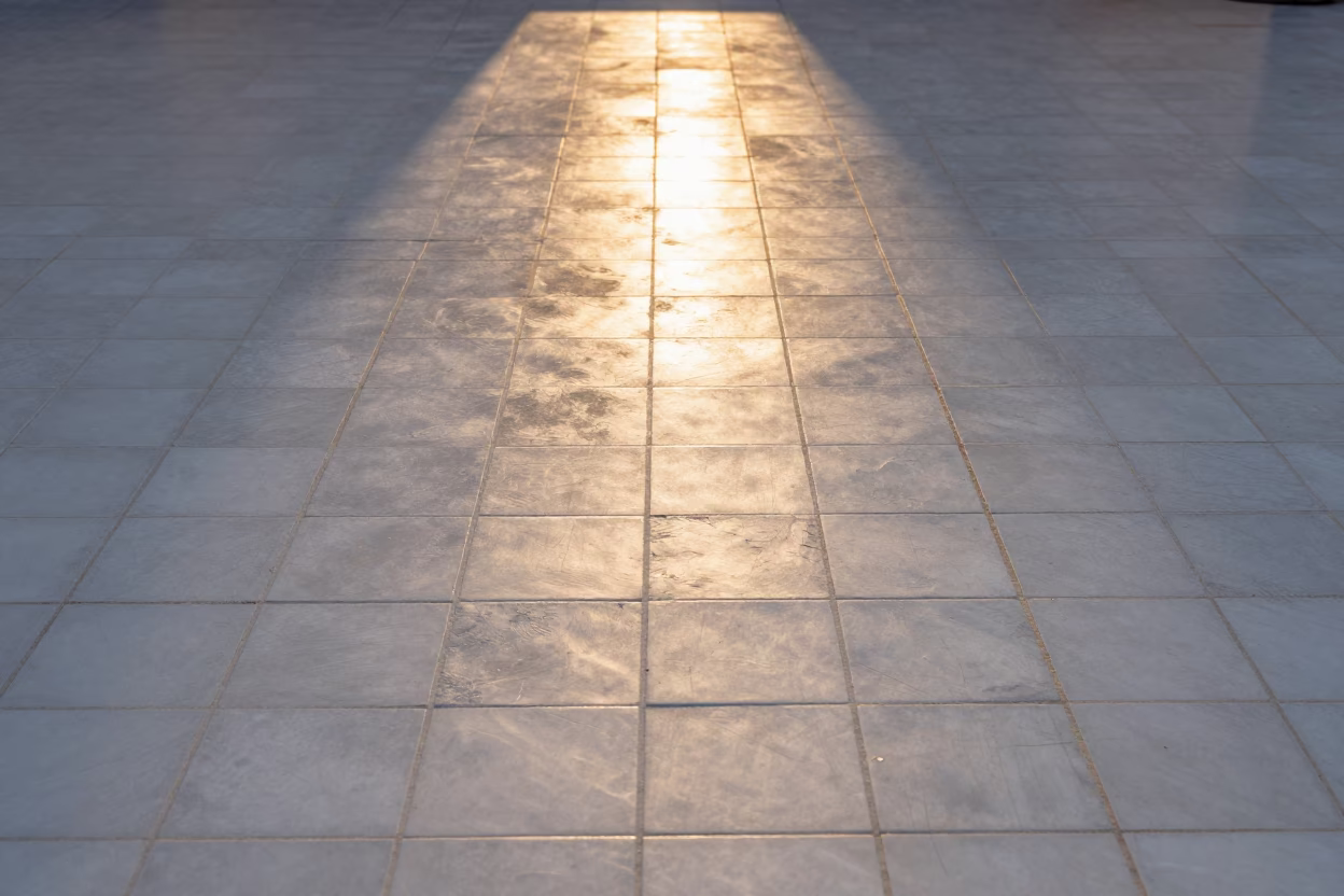 Golden Hour Light Stripes Across Traditional Tile Grout in Seville Spain in in Seville, Spain