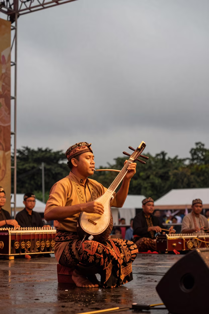 Golden Hour Rebab Player in Jakarta Gamelan in on a festival main stage in Blok M, Jakarta