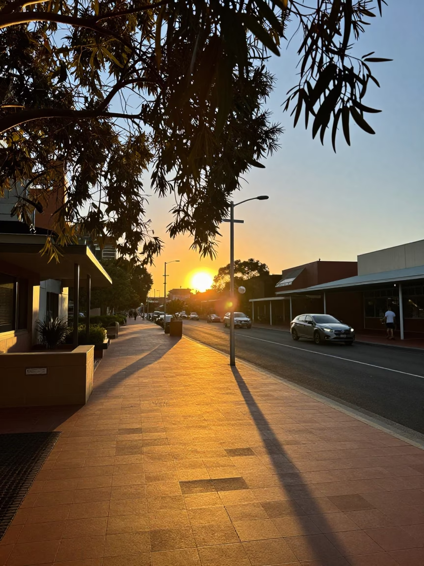 Golden Hour Street Scene in Adelaide with Leaf Shadows on Tile Pavement in in Adelaide, South Australia, Australia