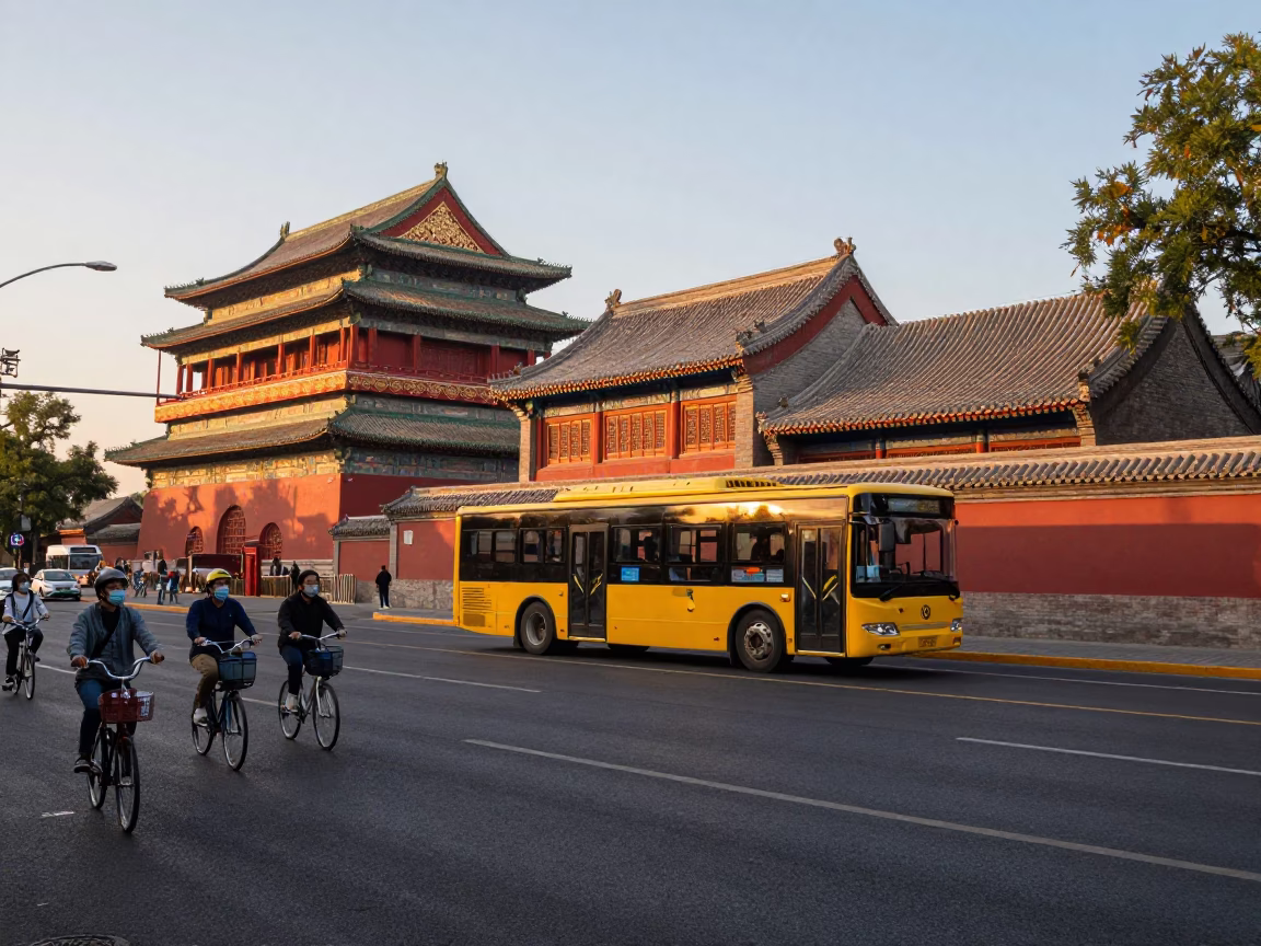 Golden Hour Street Scene in Beijing China with Classic Bus and Cyclists Near Temple in in Beijing, China