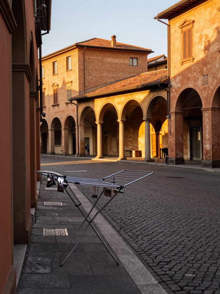 Golden Hour Street Scene in Bologna Italy with Drying Rack and Cutlery in in Bologna, Italy