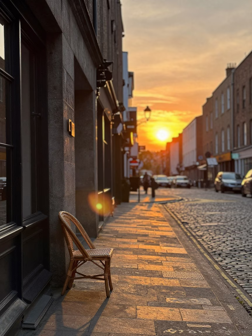 Golden Hour Street Scene in Dublin Ireland with Rattan Chair and Tea Stains in in Dublin, Ireland