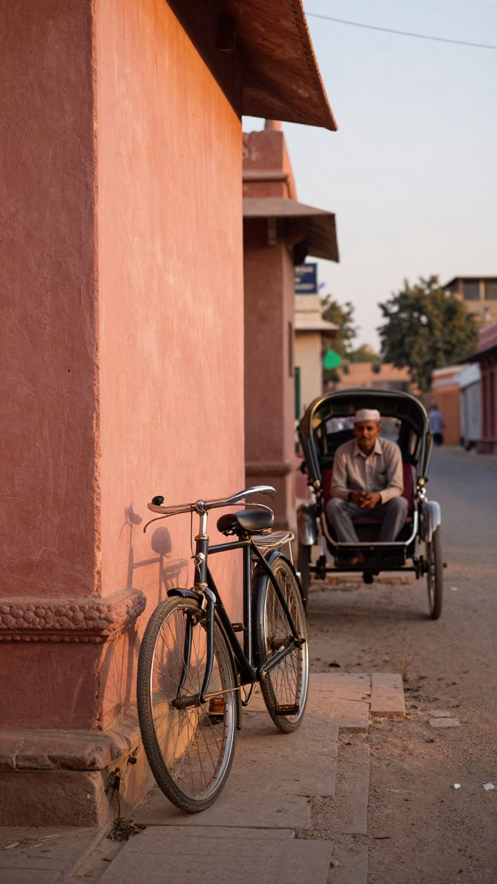 Golden Hour Street Scene in Jaipur India with Vintage Bicycle and Rickshaw in in Jaipur, India