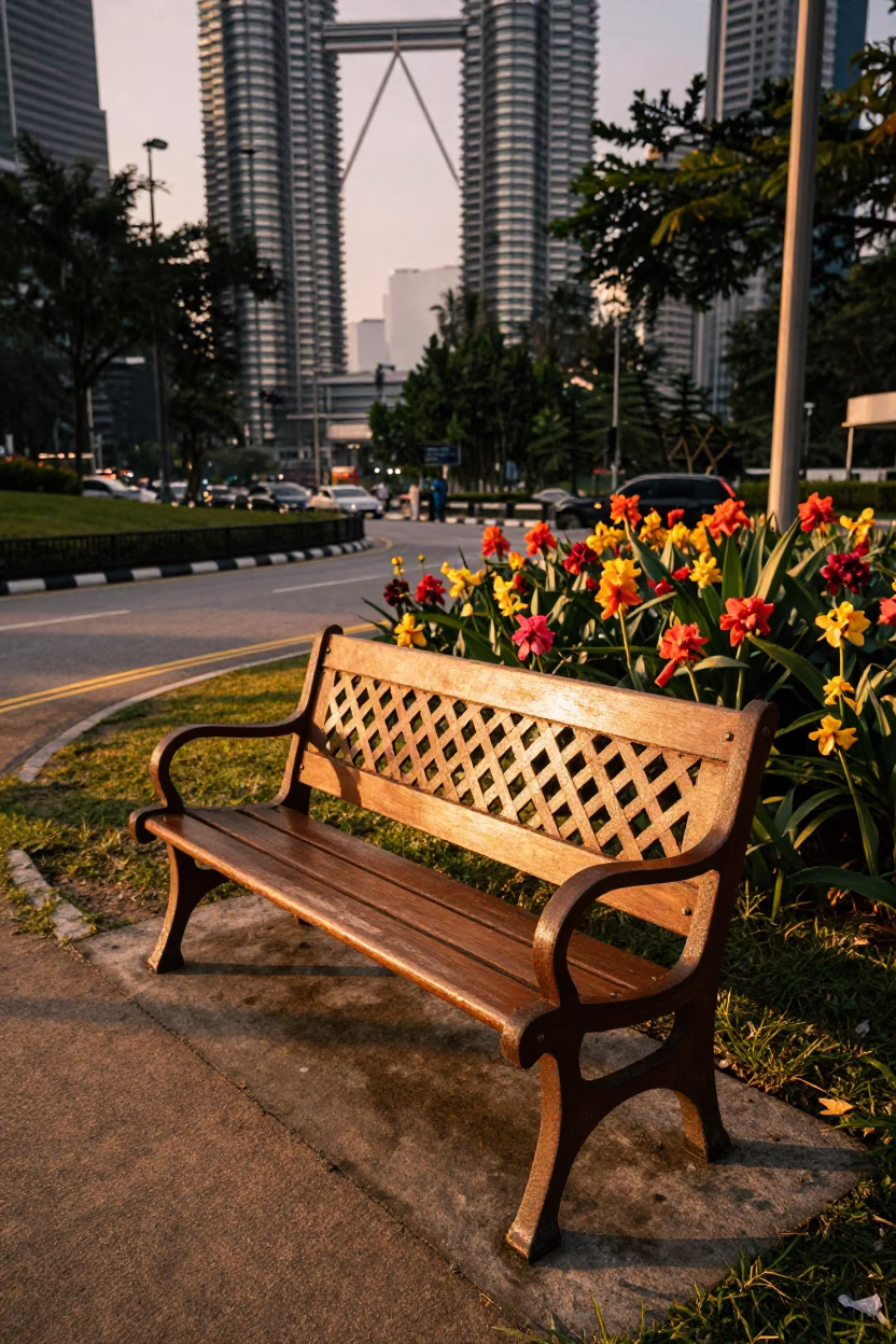Golden Hour Street Scene in Kuala Lumpur with Park Bench and Zinnias in in Kuala Lumpur, Malaysia