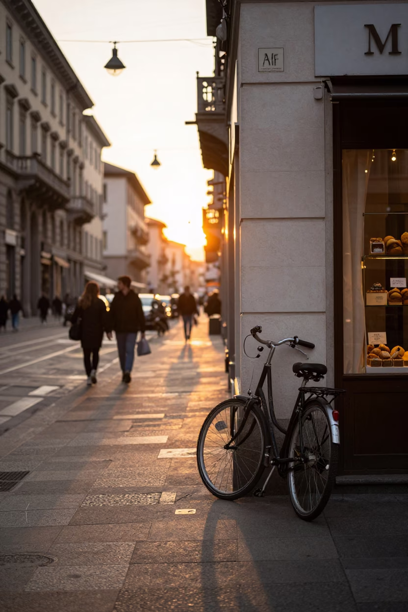 Golden Hour Street Scene in Milan Italy with Bicycle and Bakery in in Milan, Italy