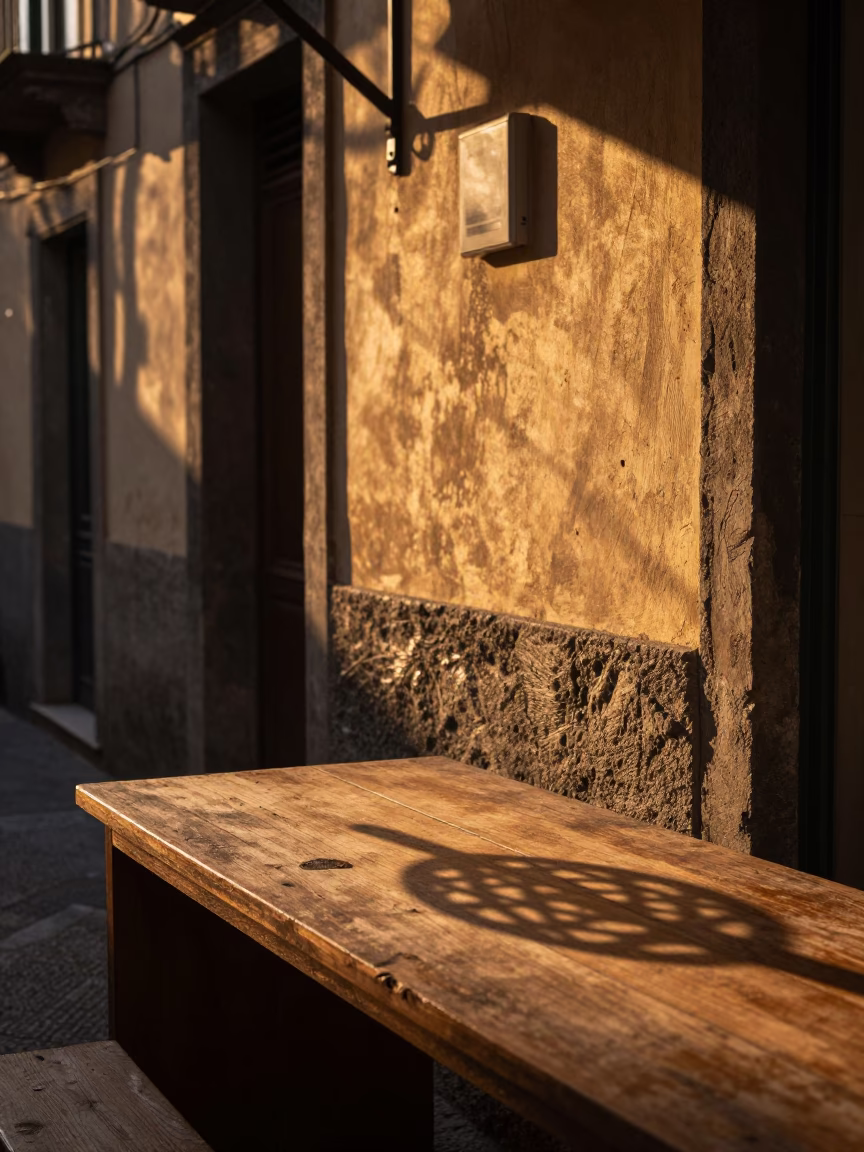 Golden Hour Street Scene in Naples Italy with Wicker Shadow on Countertop in in Naples, Italy