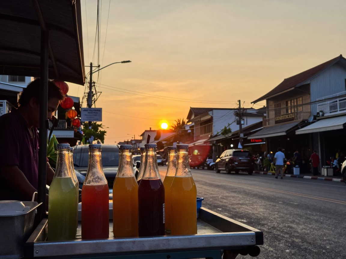Golden Hour Street Scene in Phuket Thailand with Lanterns and Glass Bottles in in Phuket, Thailand