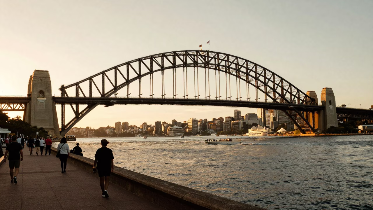 Golden Hour Sydney Harbour Bridge and Circular Quay Pedestrians with Waterfront Dining in in Sydney, New South Wales, Australia