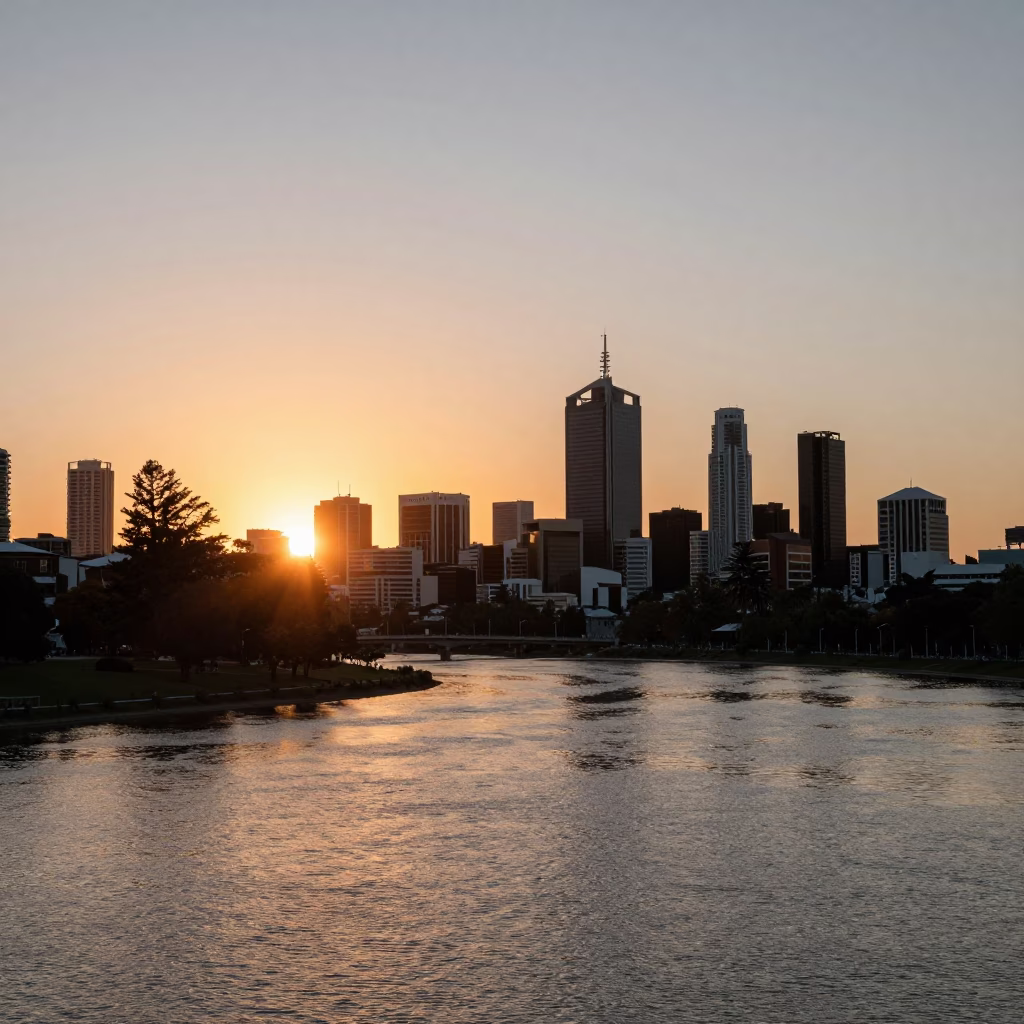 Golden Hour View of Perth City Skyline and Swan River with Boats at Sunset in in Perth, Western Australia, Australia