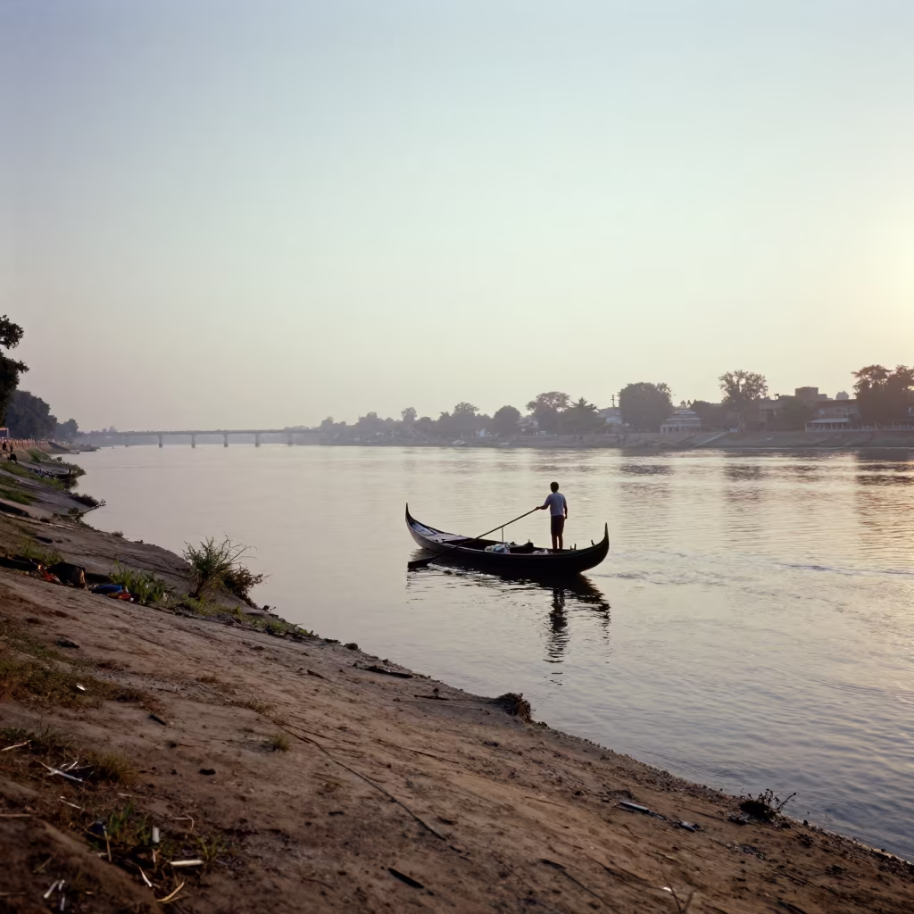 Gondolier Rowing Yamuna River at Sunrise Delhi in near a riverside landing in Delhi