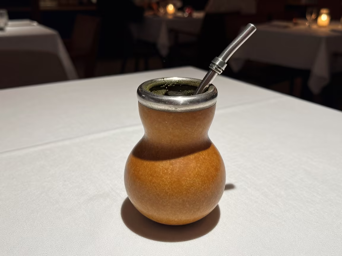 Gourd of Argentine Yerba Mate on Linen in on a linen-covered restaurant table in Navi Mumbai