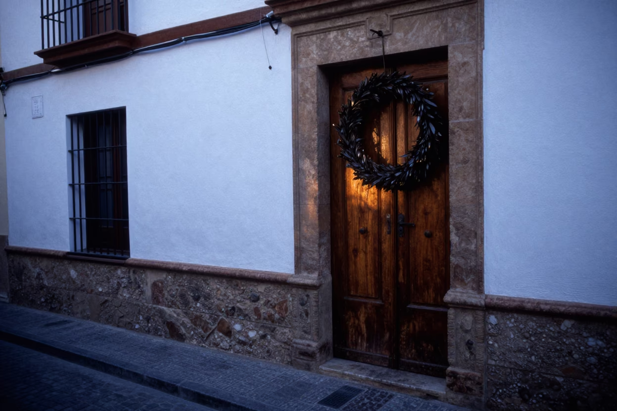 Granada Spain Dawn Street Scene with Traditional Door Wreaths and Morning Light in in Granada, Spain