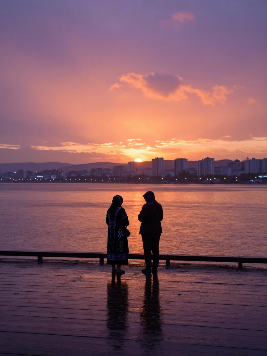 Grandmother and Girl Embroidering at Almaty Harbor Sunset in at a harbor edge in Almaty