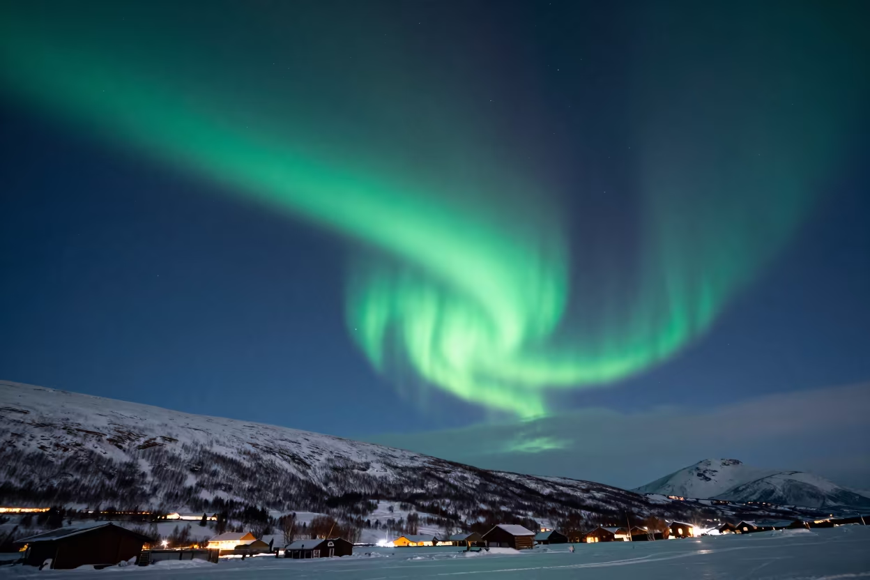 Green Aurora Corona Overhead Near Tromsø in under a band of cold starlight near Tromsø
