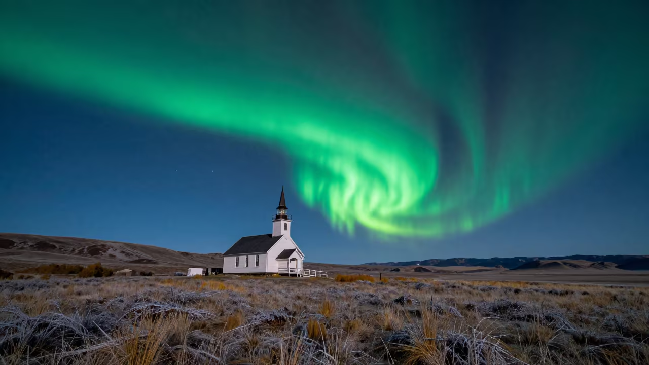 Green Aurora Over Nevada Church Steeple in from a frost-hushed ridgeline in Nevada