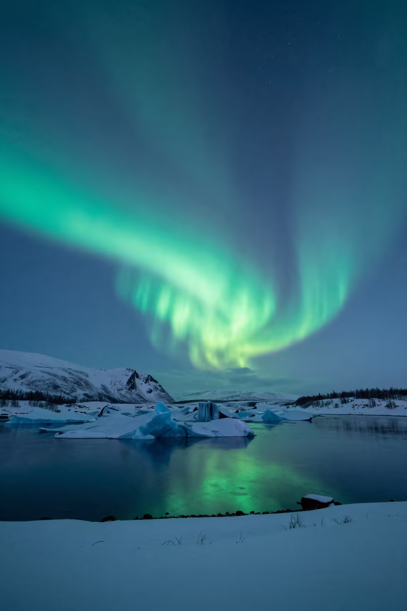 Green Aurora Over Winter Lagoon Near Murmansk in from a quiet alpine saddle near Murmansk