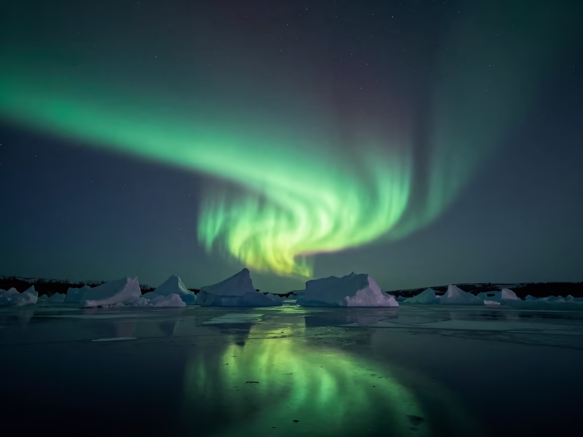 Green Aurora Reflections on Arctic Pack Ice Canada in under a band of cold starlight in Canada