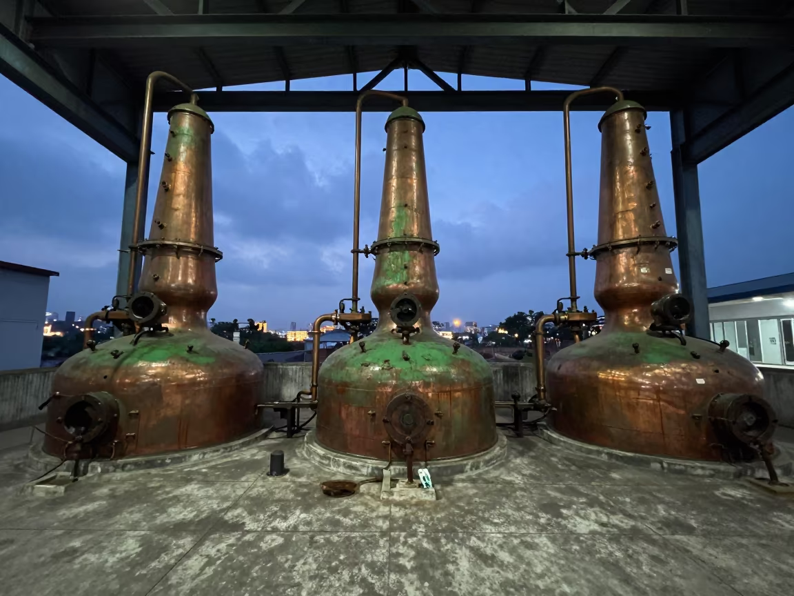 Green Copper Stills in Junagadh Welding Bay in in a welding bay near Junagadh