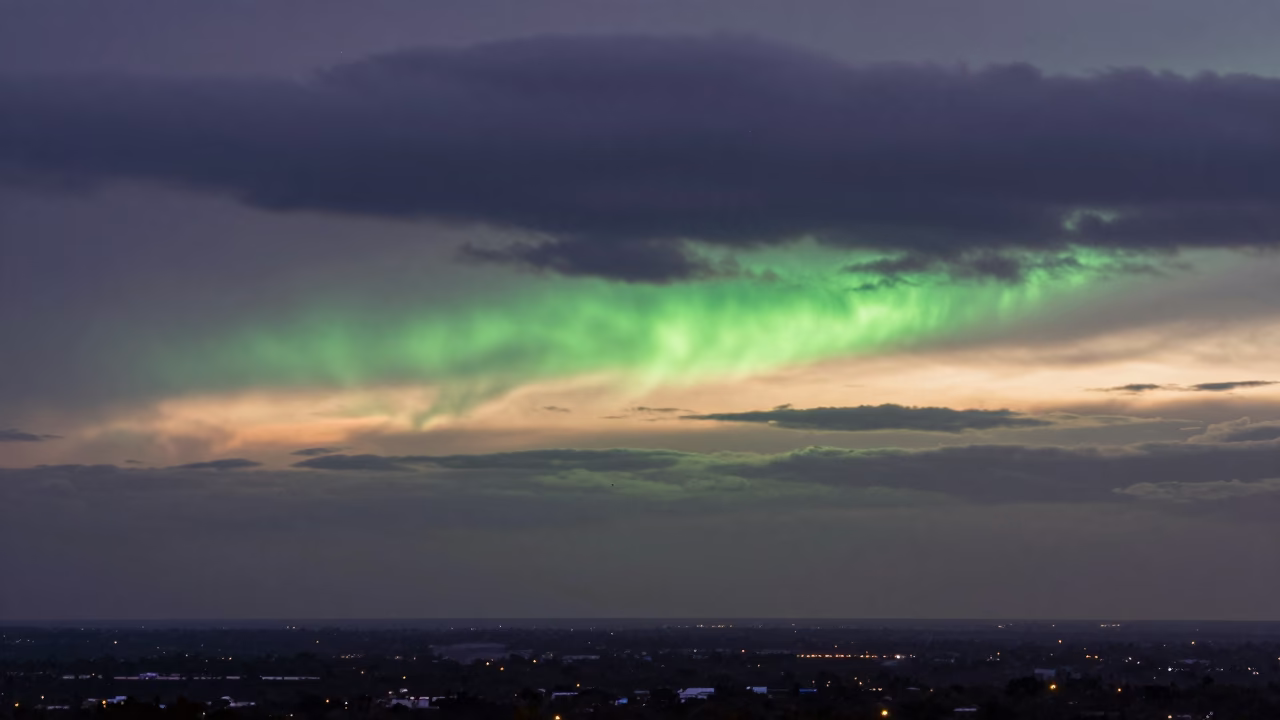 Green Flash Sunset Over Mexico Cloud Bands in beneath fast-moving cloud bands in Mexico