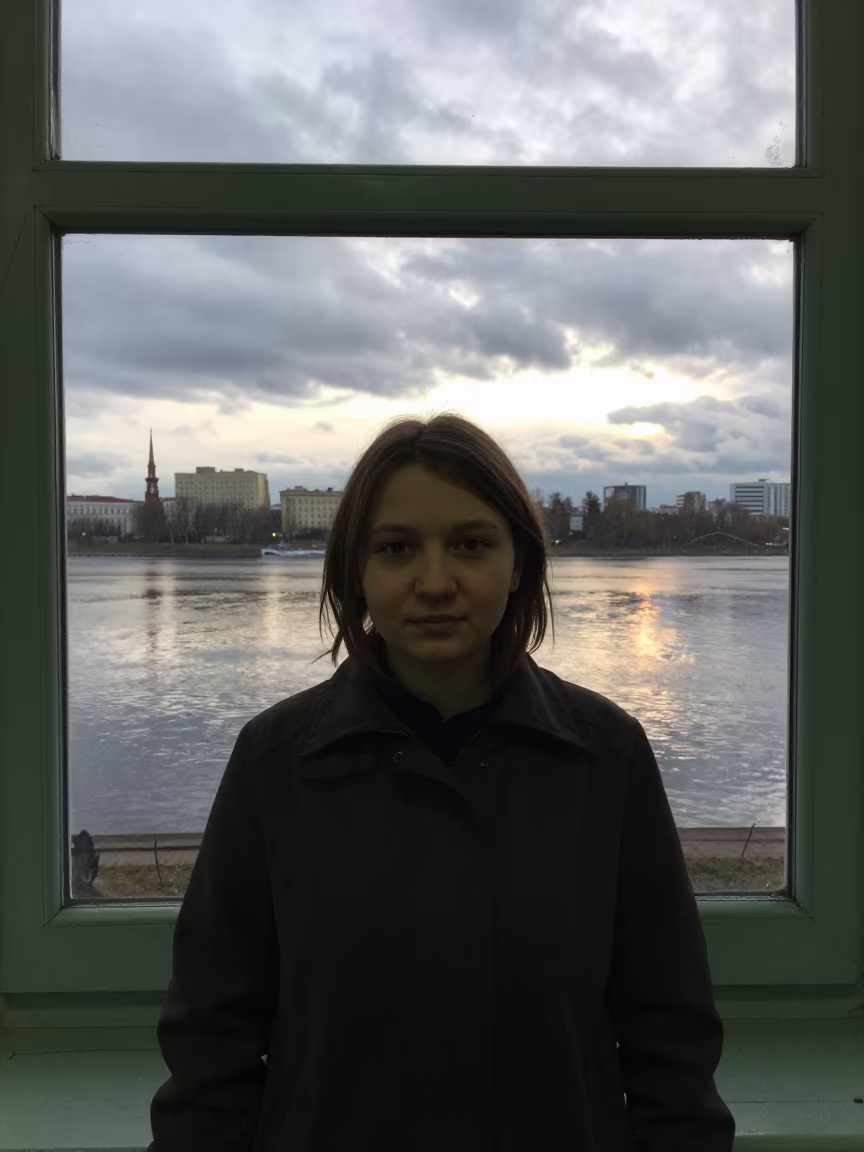 Green Window Light Librarian Portrait in near a riverside landing in Nizhny Novgorod
