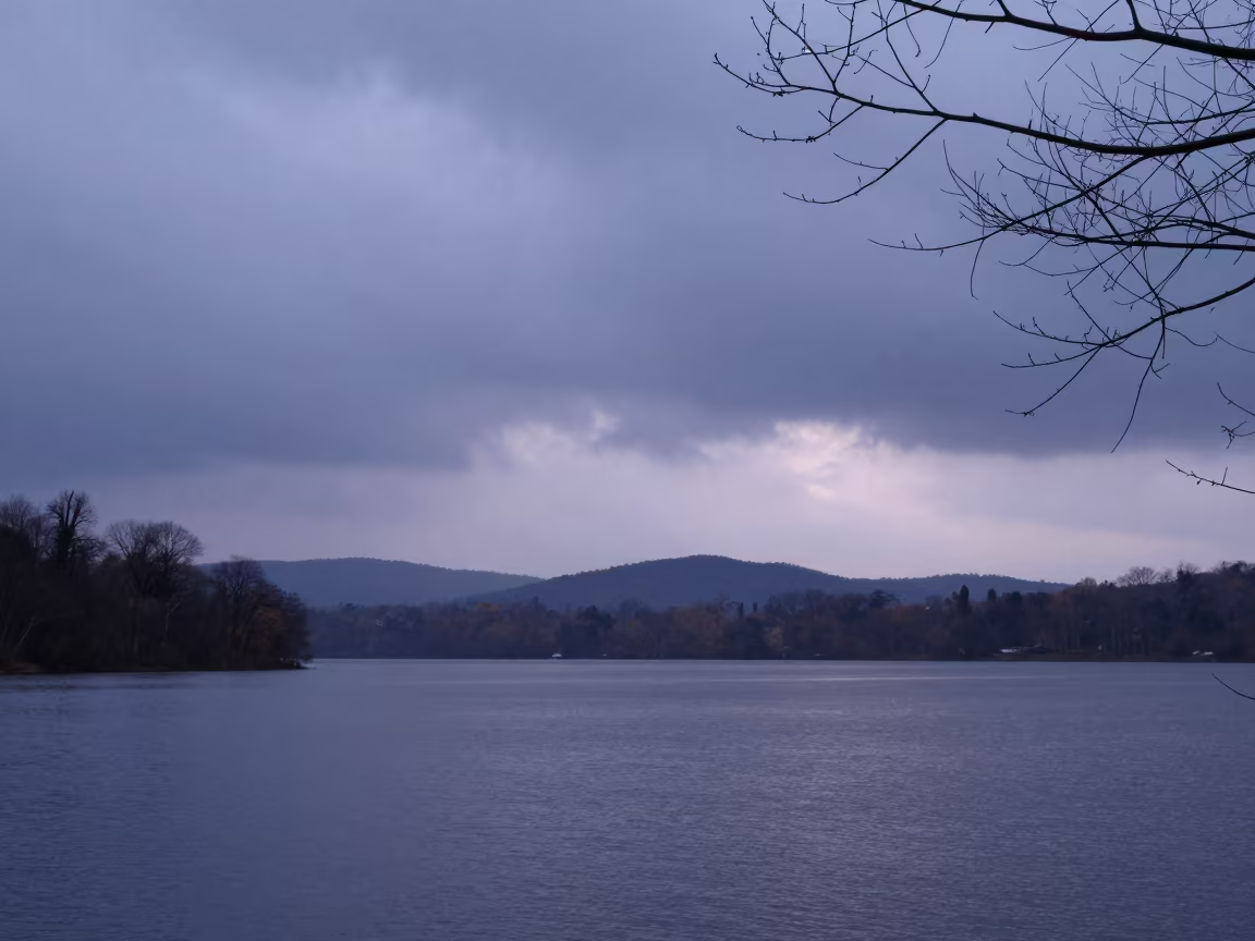Grey November Lake Under Overcast Indigo Sky in near Jinja