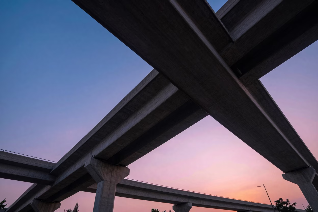 Guadalajara Highway Flyover Stack Cutting Across Pink Evening Sky at Sunset in in Guadalajara, Mexico