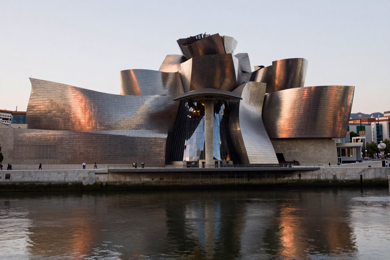 Guggenheim Bilbao Museum and Nervion River Reflections in Copper Twilight in in Bilbao, Spain