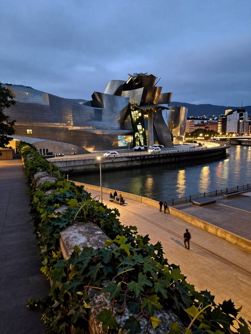 Guggenheim Bilbao Twilight Street Scene with Monorail and Ivy Vines in in Bilbao, Spain