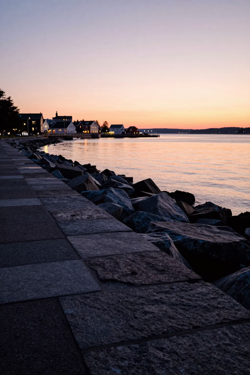 Halifax Waterfront Stone Seawall at Sunrise with Harbour Lights in in Halifax, Nova Scotia, Canada