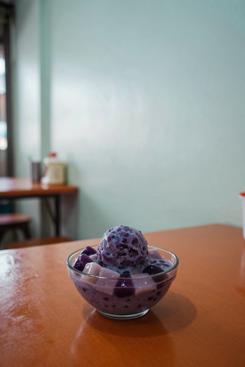Halo Halo Bowl with Purple Yam Ice Cream in Davao in at a roadside diner table in Davao