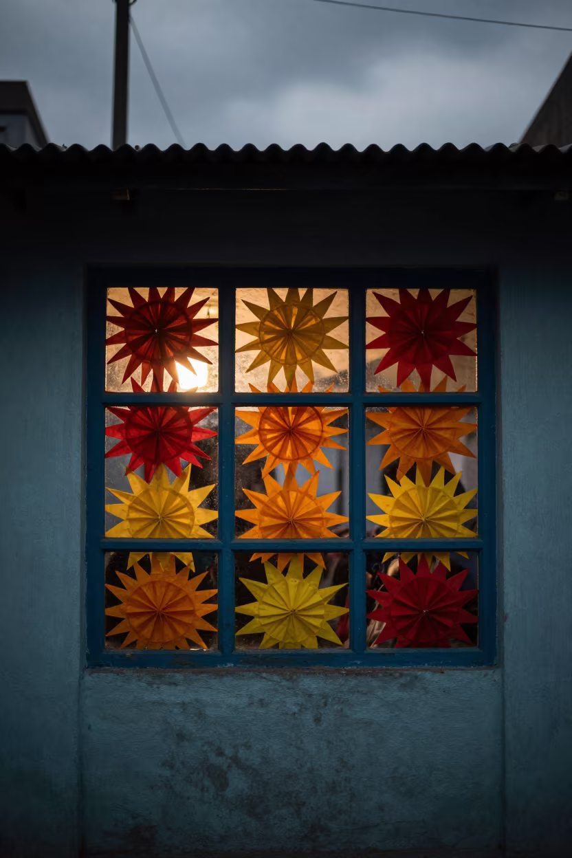 Handmade Tissue Paper Suns on School Window in along a schoolyard walkway near Brahmanbaria