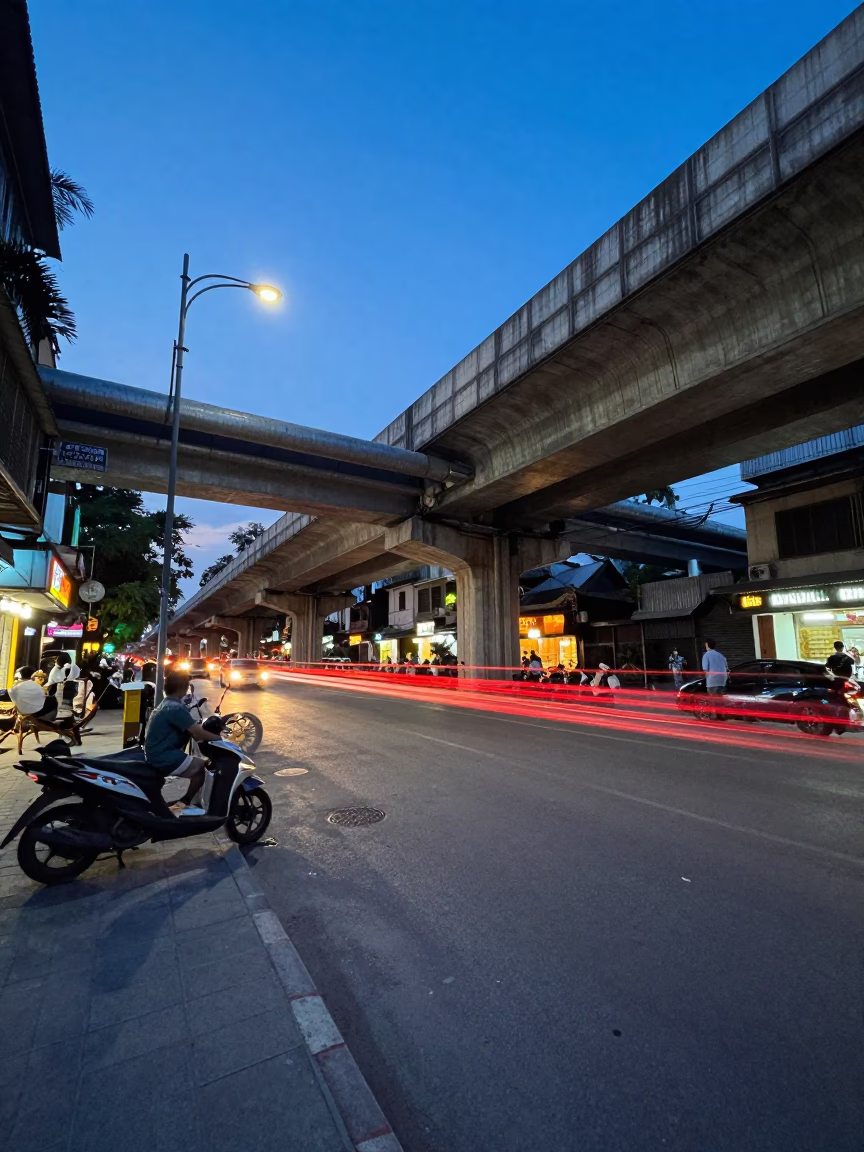 Hanoi Vietnam Blue Hour Street Scene with Overpass and District Heating Pipes in in Hanoi, Vietnam