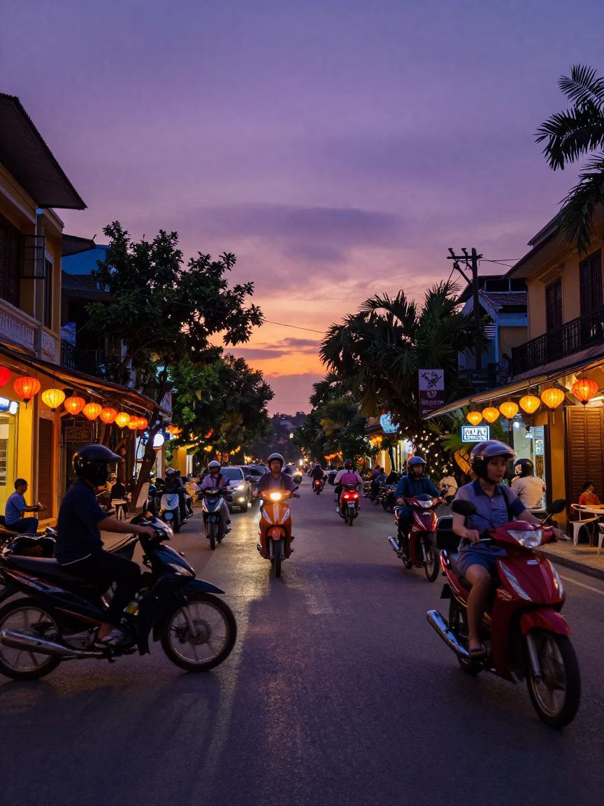 Hanoi Vietnam Evening Street Scene with Motorbikes and Traditional Lanterns at Sunset in in Hanoi, Vietnam