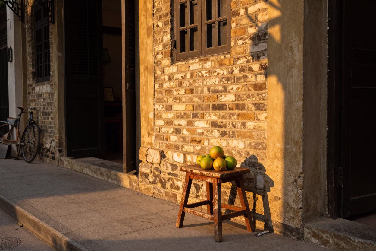 Hanoi Vietnam Evening Street Scene with Rusty Stool and Fruit Crate in in Hanoi, Vietnam