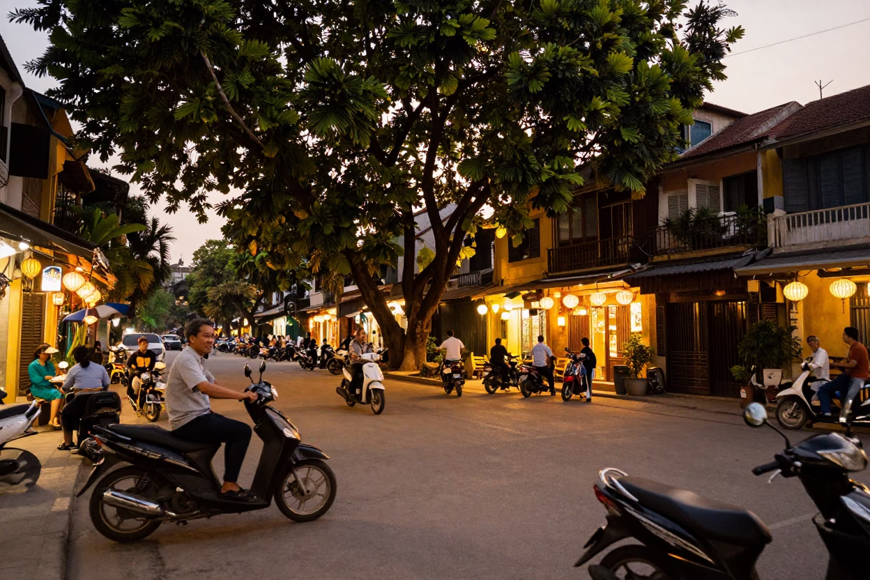 Hanoi Vietnam Evening Street Scene with Vintage Scooters and Lanterns in in Hanoi, Vietnam
