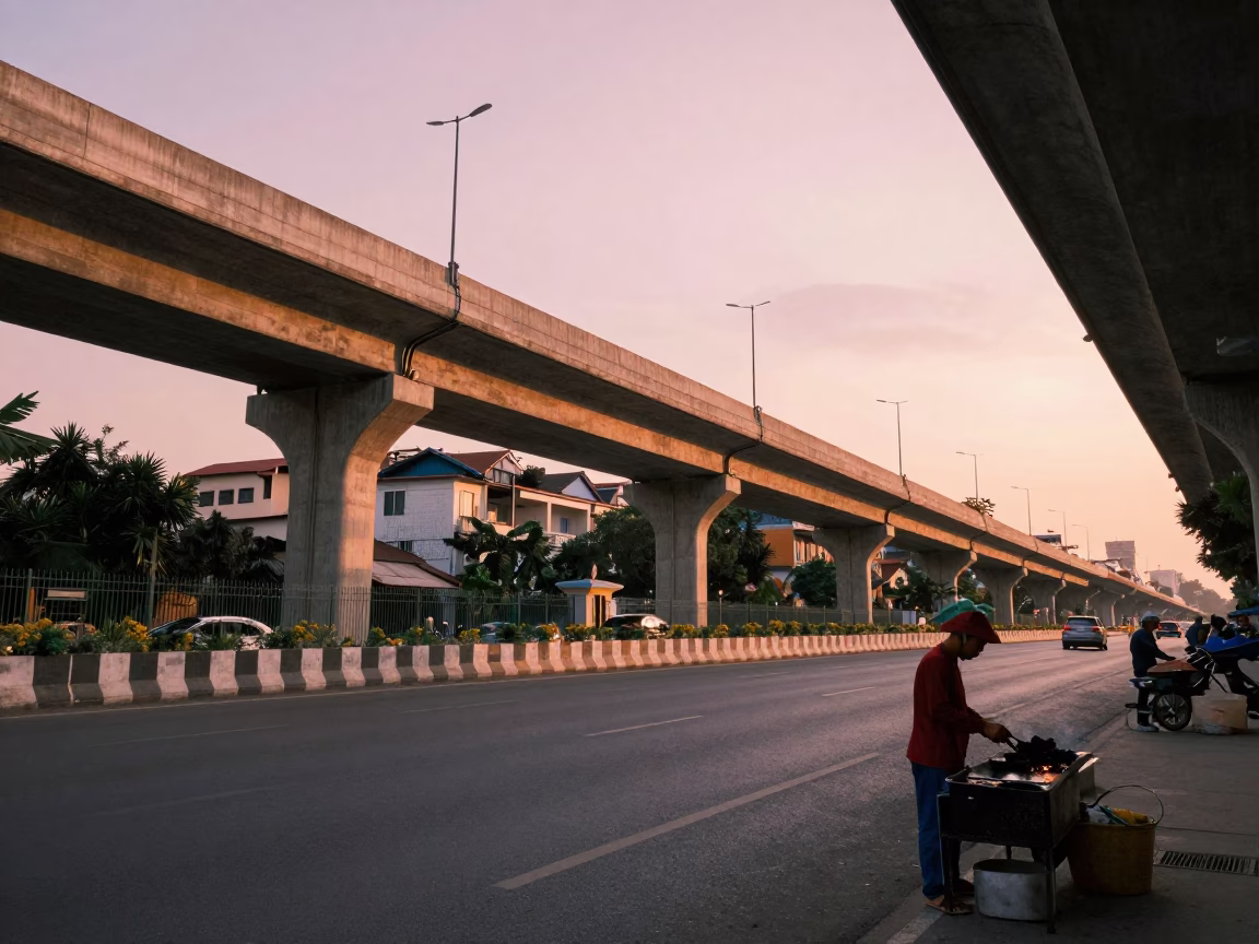 Hanoi Vietnam Golden Hour Highway Flyover and Charcoal Street Food Vendor in in Hanoi, Vietnam