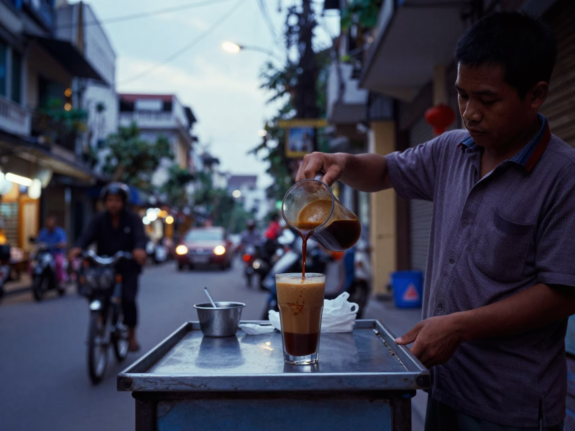 Hanoi Vietnam Nautical Dawn Street Scene with Glass of Vietnamese Egg Coffee in in Hanoi, Vietnam